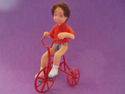 Boy on Tricycle Hand Sculpted