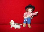 Little Cowboy with Dog