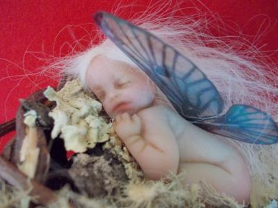 Baby Fairy Sleeping in Basket